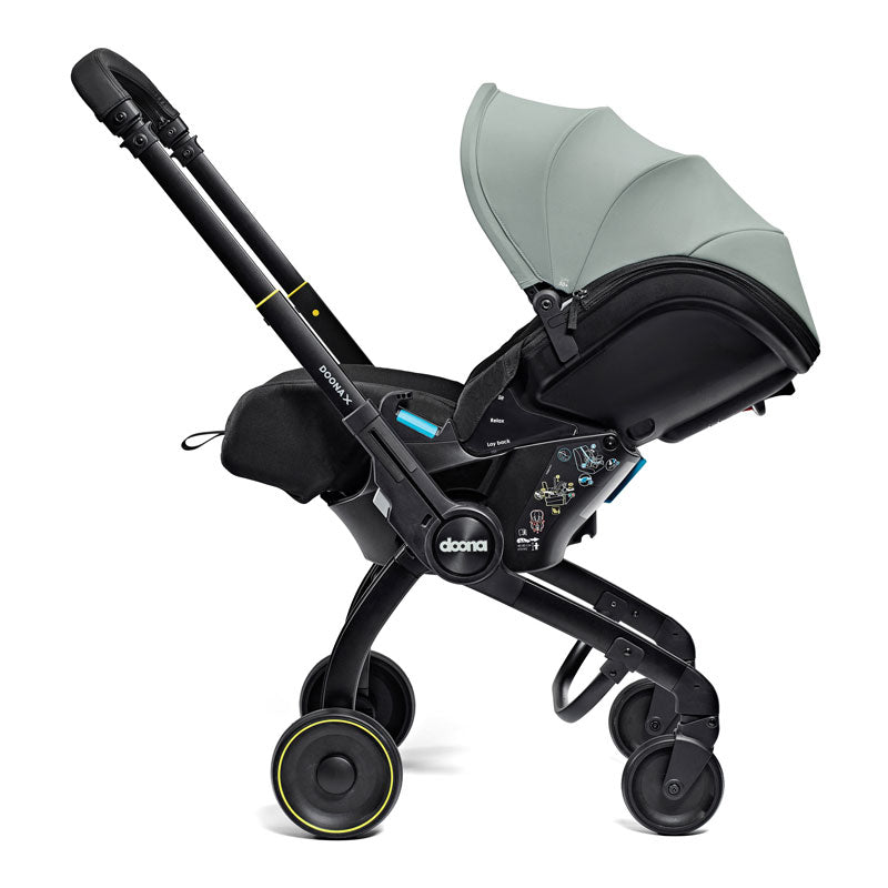 Doona Babyskydd "X" med vagn Dusty Sage